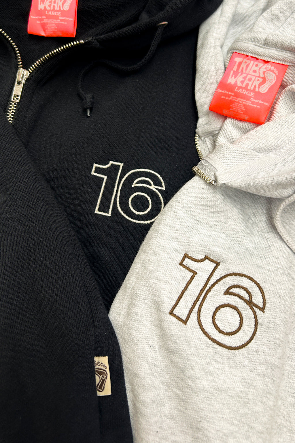 Image of 16 Sixteen embroidered logo on TRIBE WEAR zip-up hoodie